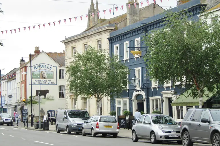 East Street in Bridport, with its wide pavements and independent shops