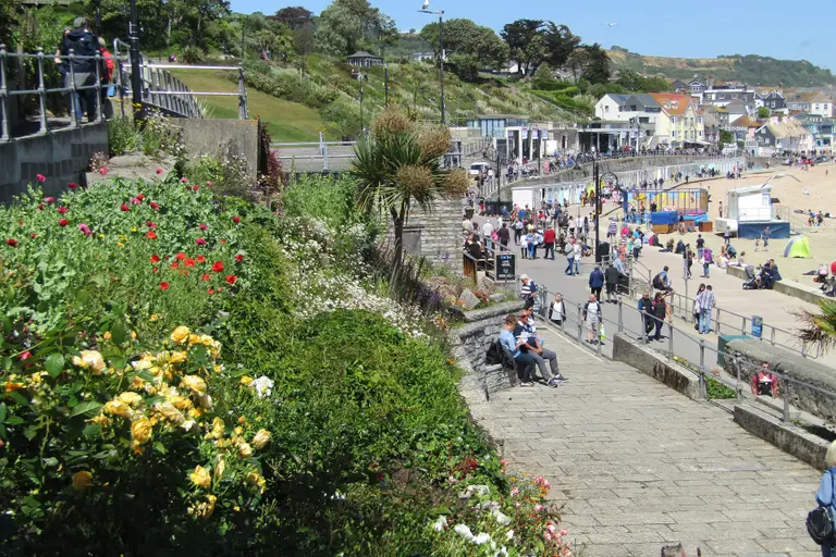 Langmoor Gardens in Lyme Regis, with paths and lawns above the sea
